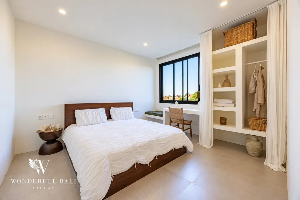 2BR villa for rent in Munggu — bedroom with double bed and built-in wardrobe