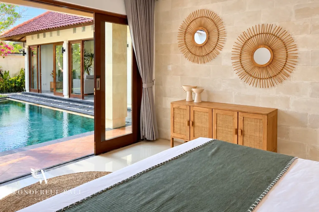3BR villa Berawa, Canggu — bedroom opening onto the pool