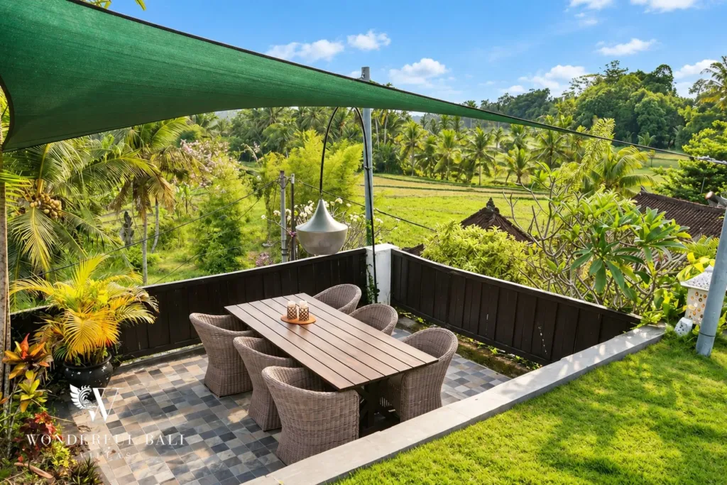 3BR villa for rent in Tabanan — shaded garden dining table overlooking the rice terraces