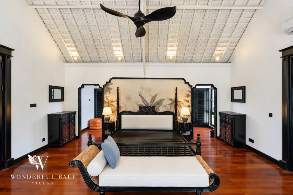7BR villa for sale in Umalas — main suite with four-poster bed and hardwood floor