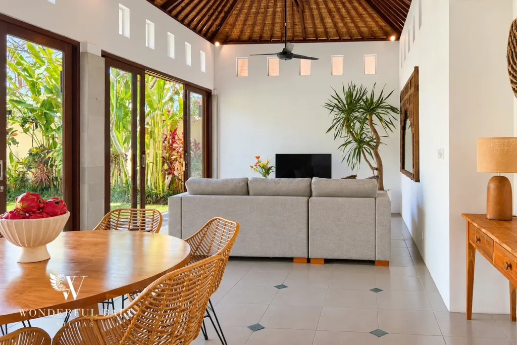3BR villa Berawa, Canggu — dining and living area with garden doors