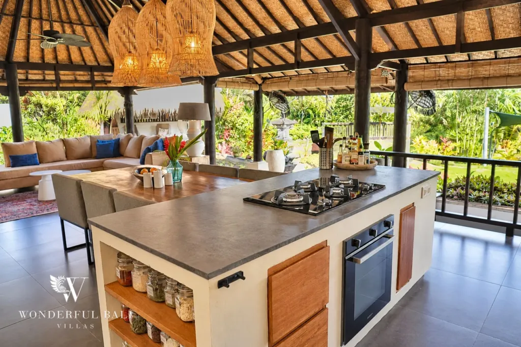 3BR villa for rent in Tabanan — kitchen island with gas hob, oven and open shelving