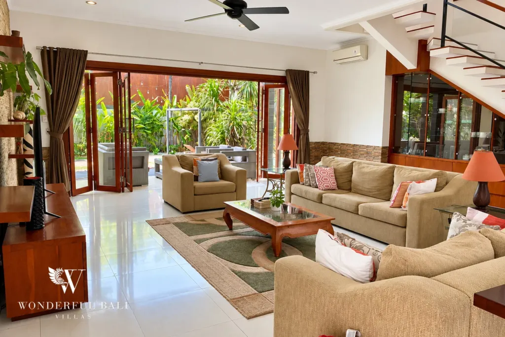 3BR villa for rent in Sanur — living room opening fully onto the garden