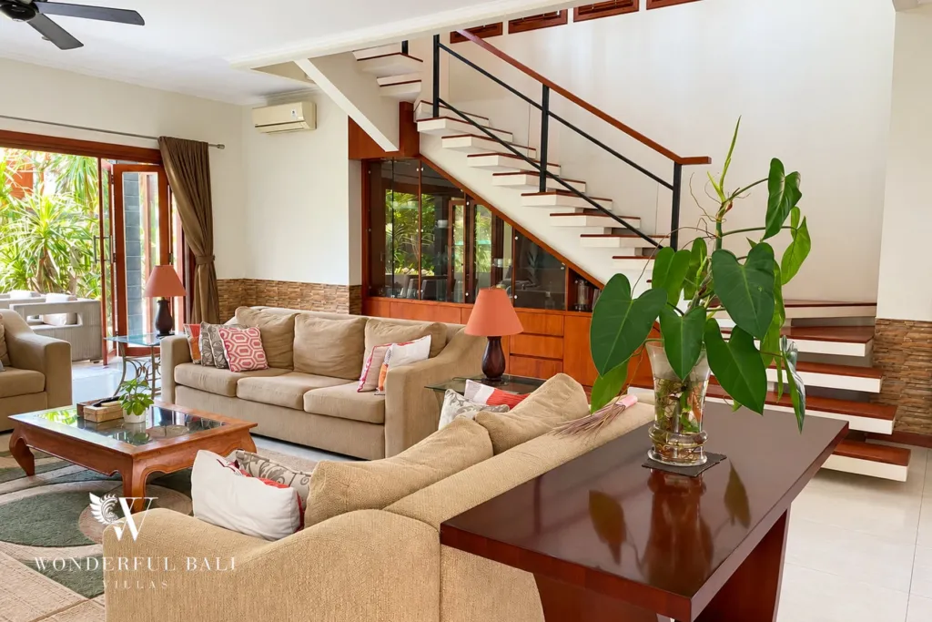 3BR villa for rent in Sanur — living room with floating staircase