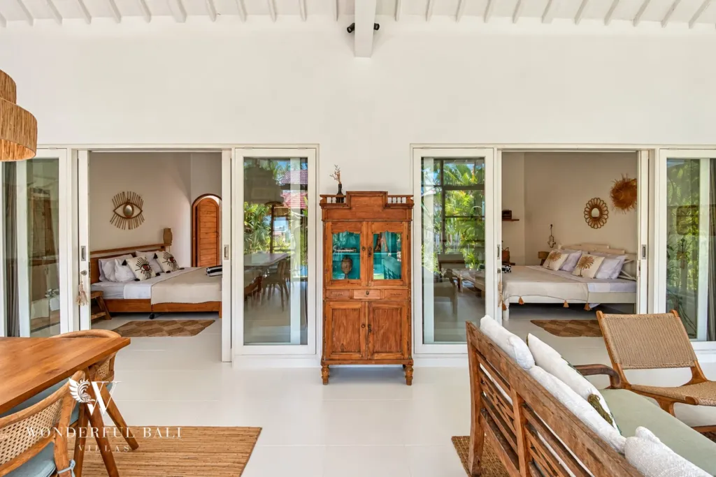 2BR villa Berawa, Canggu — living room with doors to both bedrooms