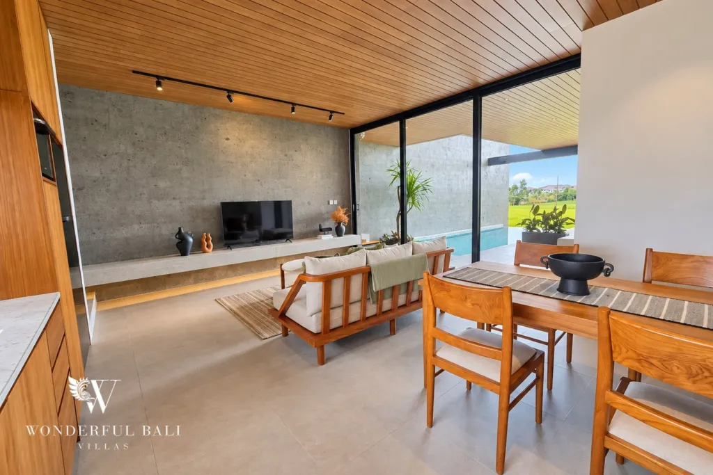 3BR villa long term rental Canggu — dining and living area under a timber ceiling