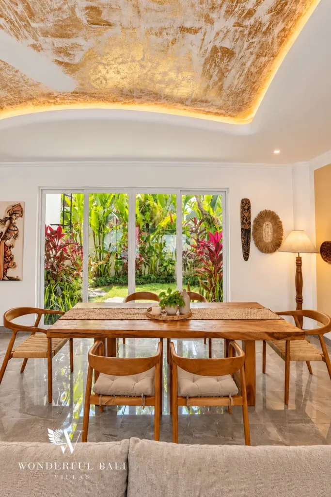 3BR villa for rent in Padonan — dining table facing the tropical garden