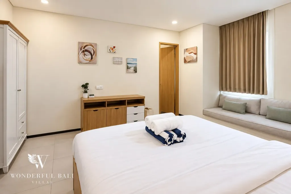 2BR villa for sale in Sanur — primary bedroom with window seat and wardrobe