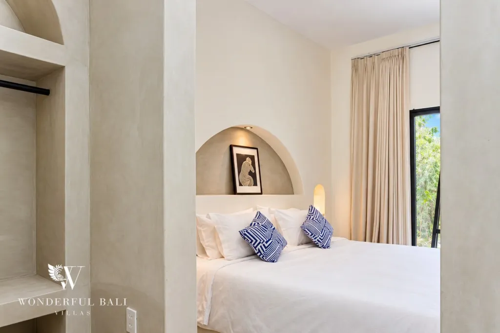 2BR villa for sale in Sanur — bedroom with arched headboard niche