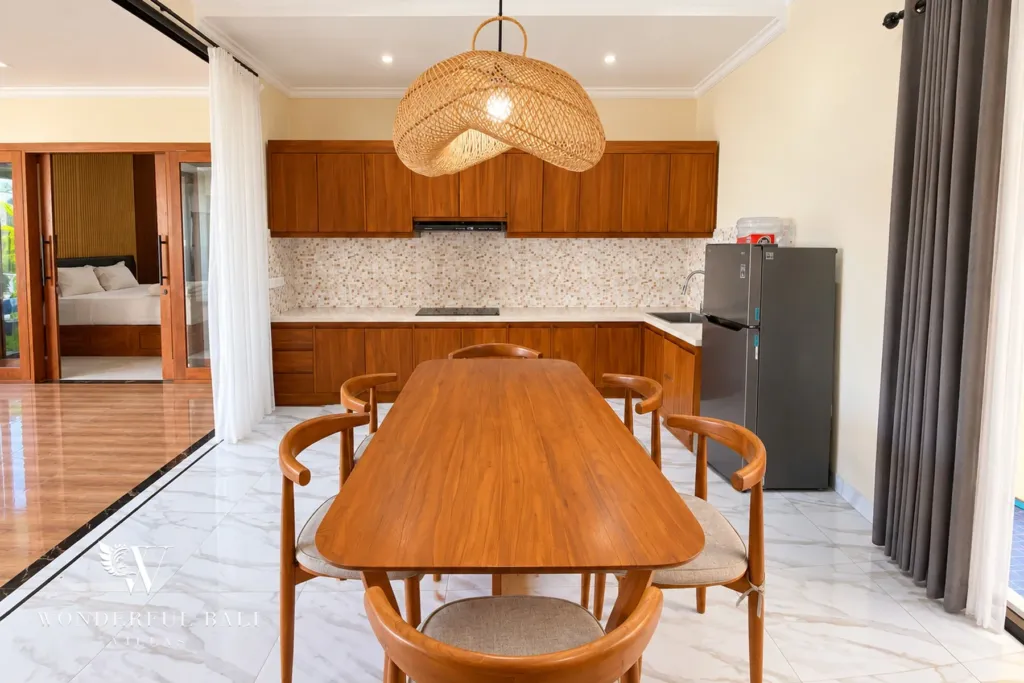 3BR villa for sale or rent in Sanur — kitchen and dining area opening to the living hall
