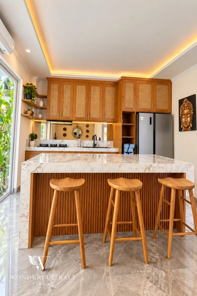 3BR villa for rent in Padonan — breakfast bar with three stools and timber cabinets