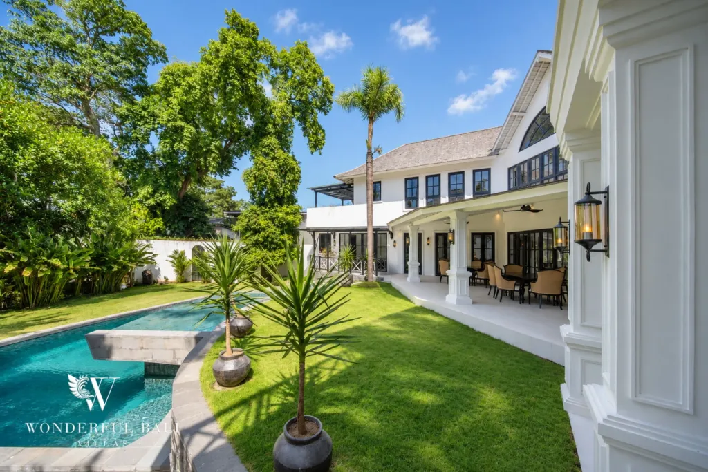 7BR villa for sale in Umalas — covered dining veranda opening onto the lawn and pool