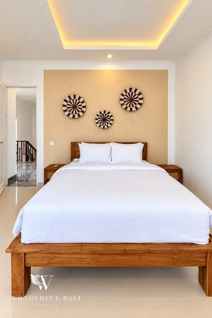 3BR villa for rent in Padonan — bedroom with double bed and soft cove lighting