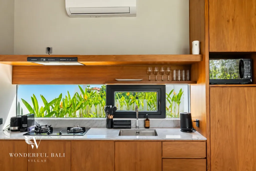 3BR villa long term rental Canggu — kitchen with gas hob and microwave