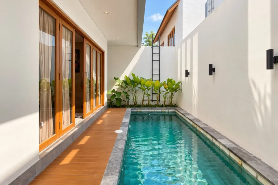 3BR villa for rent in Sanur — private pool with timber deck along the living room glass doors