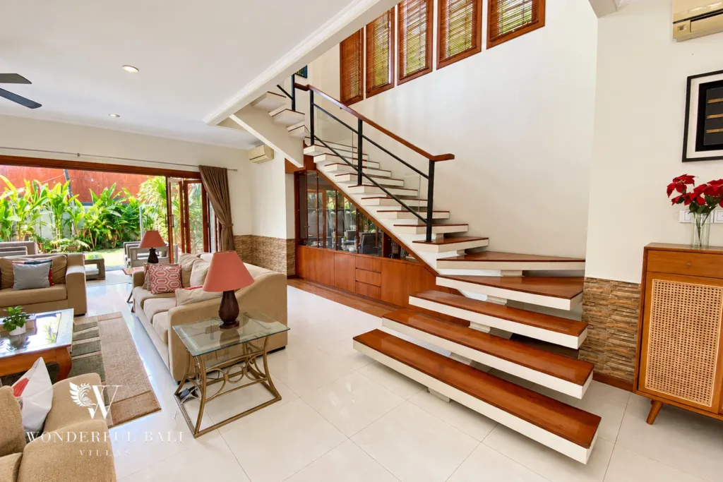 3BR villa for rent in Sanur — floating timber staircase to the upper floor