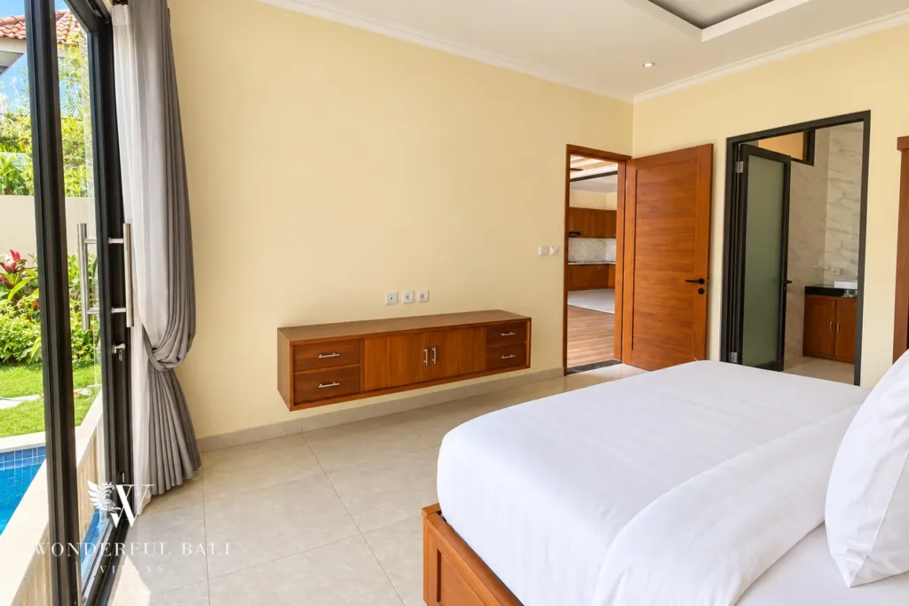 3BR villa for sale or rent in Sanur — bedroom with garden doors and en-suite access