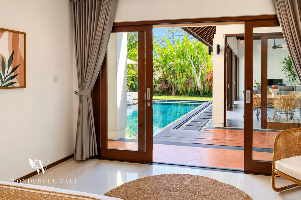 3BR villa Berawa, Canggu — bedroom with garden and pool view