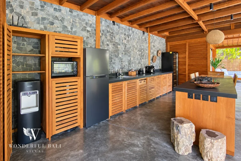 3BR villa Seseh, Canggu — kitchen with stone feature wall