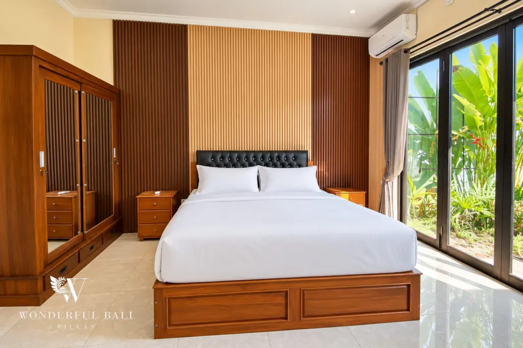 3BR villa for sale or rent in Sanur — bedroom with wardrobe and garden doors