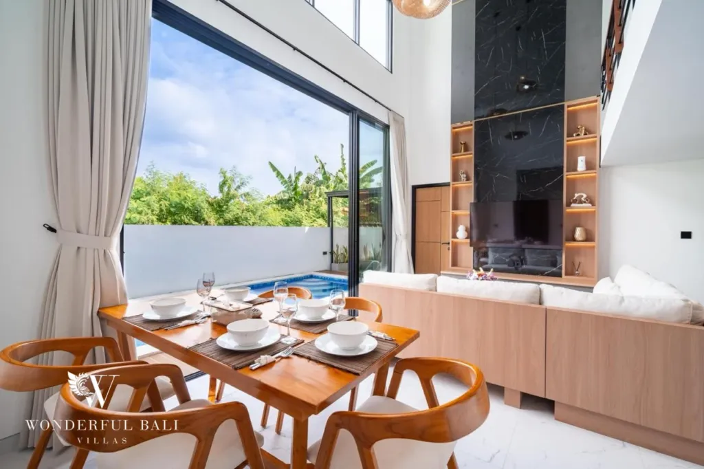 3BR villa for sale in Saba, Gianyar — wooden dining table for six beside the sofa
