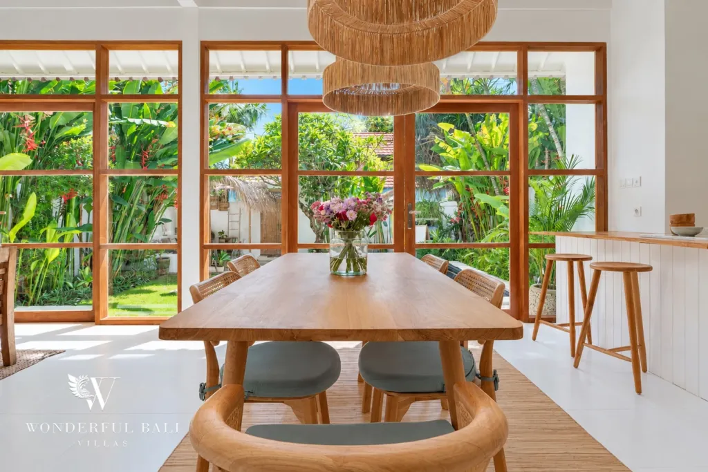 2BR villa Berawa, Canggu — dining table with garden view