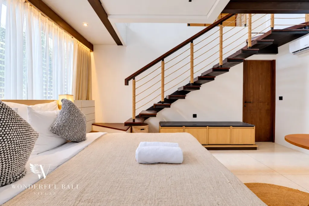 4BR villa for sale in Canggu — floating staircase rising from the bedroom