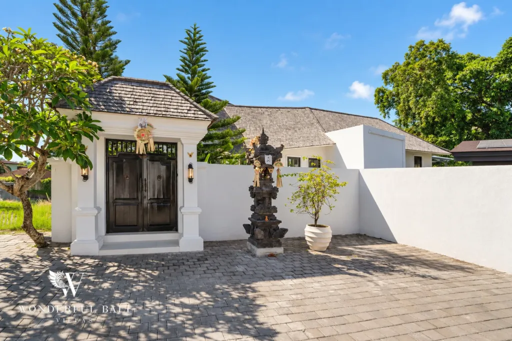 7BR villa for sale in Umalas — entrance gate and paved forecourt with parking