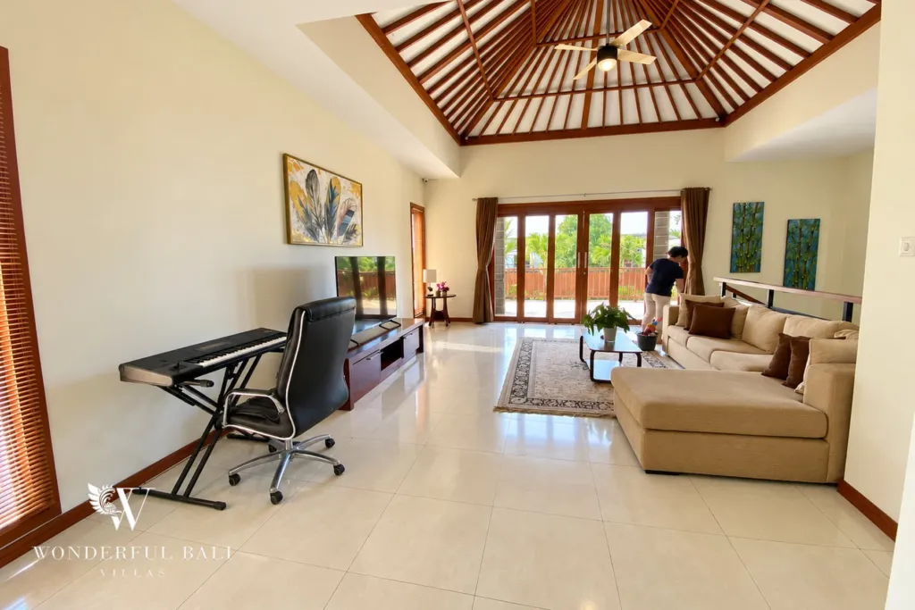 3BR villa for rent in Sanur — upstairs family room under a timber vaulted ceiling
