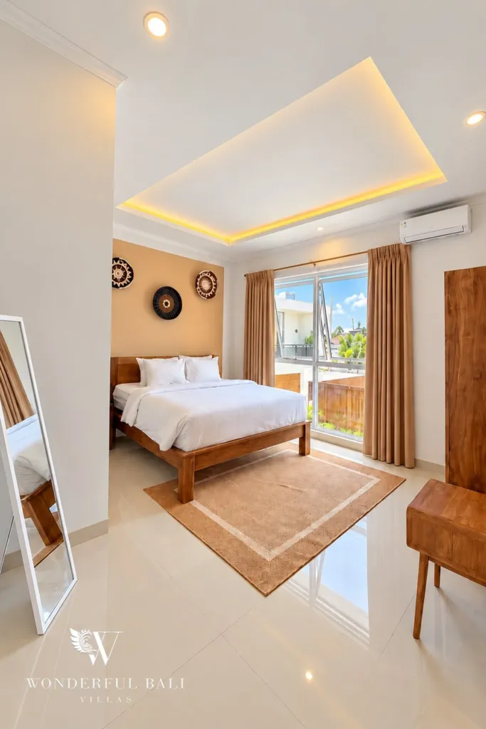 3BR villa for rent in Padonan — bedroom with rug, mirror and balcony