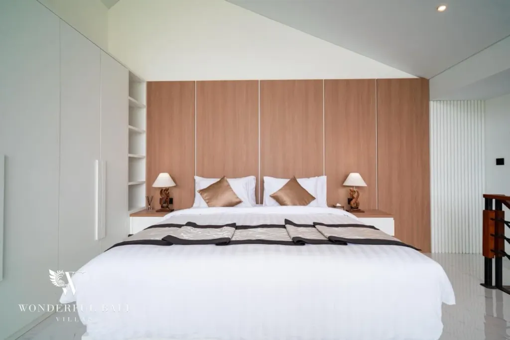 3BR villa for sale in Saba, Gianyar — bedroom with timber headboard wall and built-in wardrobe