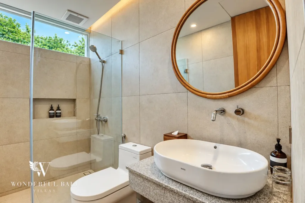 2BR villa long term rental Pererenan — bathroom with rain shower and vessel basin