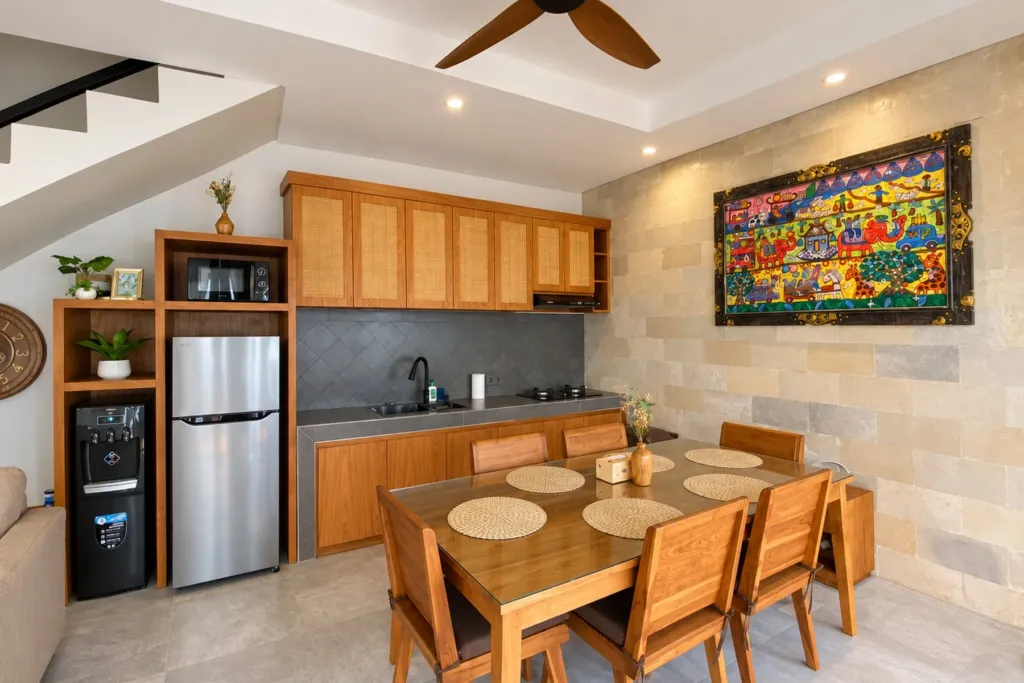 3BR villa for rent in Sanur — teak kitchen with fridge, microwave and water dispenser