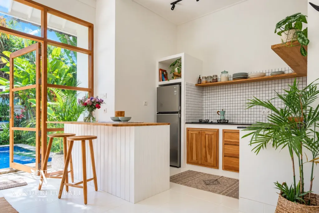 2BR villa Berawa, Canggu — kitchen with garden view