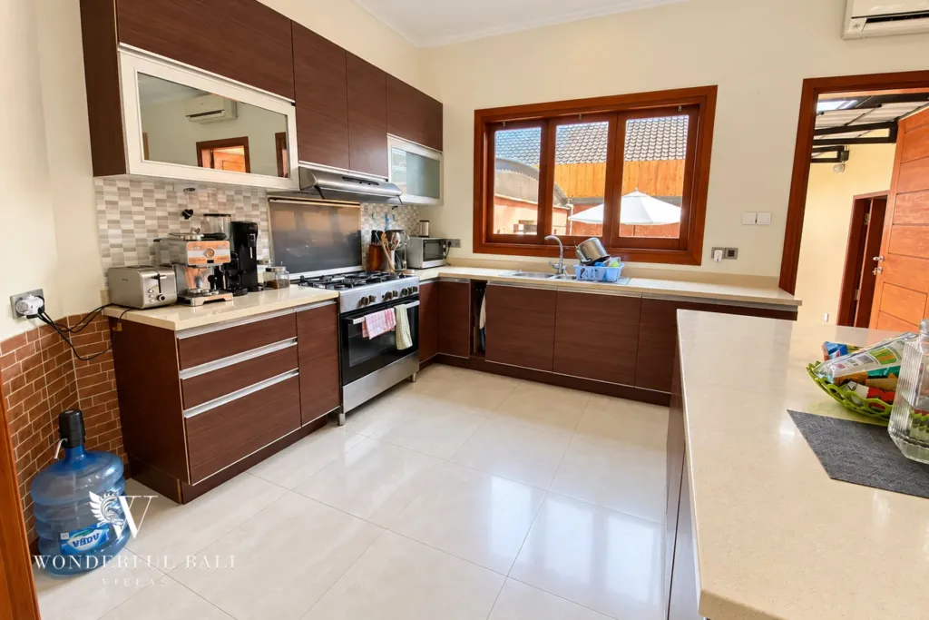 3BR villa for rent in Sanur — kitchen with gas range and long counter