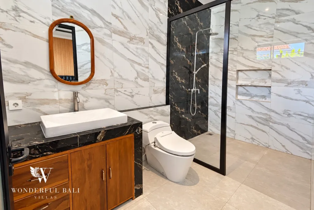3BR villa for sale or rent in Sanur — bathroom with walk-in shower and vanity