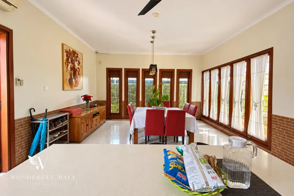 3BR villa for rent in Sanur — dining room with garden windows