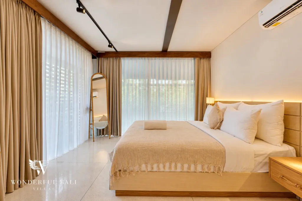 4BR villa for sale in Canggu — bedroom with floor-length curtains