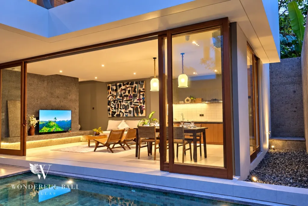 2BR villa long term rental Pererenan — pool and living area at dusk