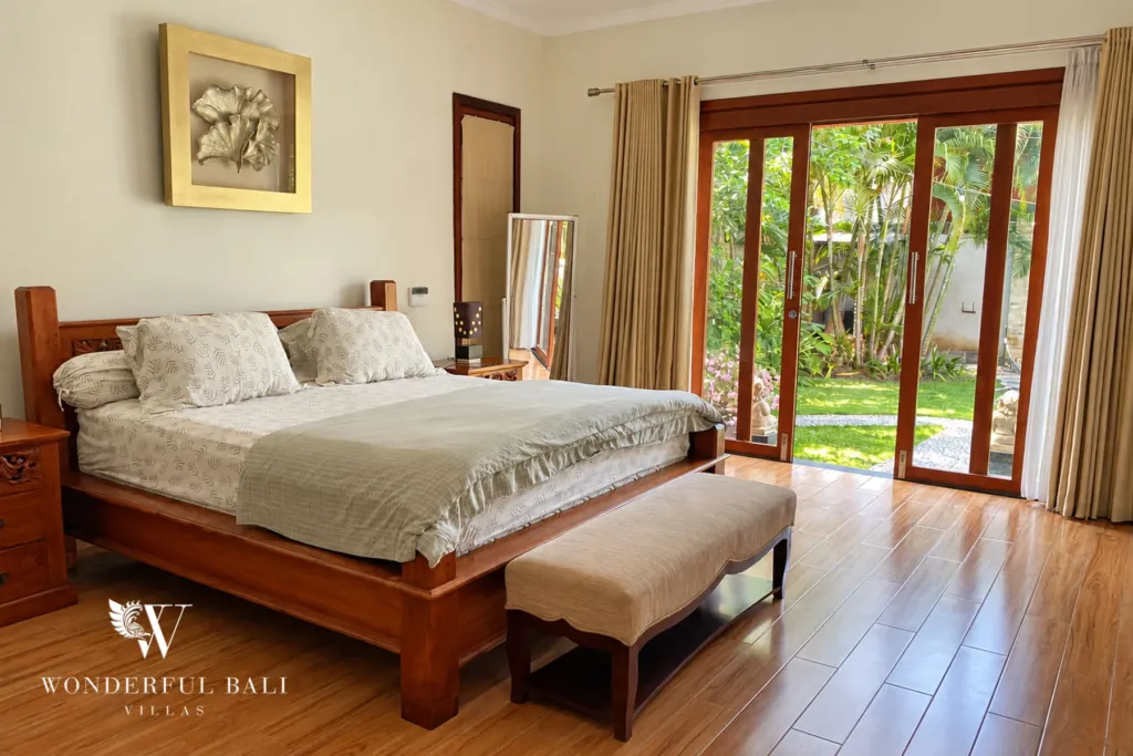 3BR villa for rent in Sanur — main bedroom opening onto the garden