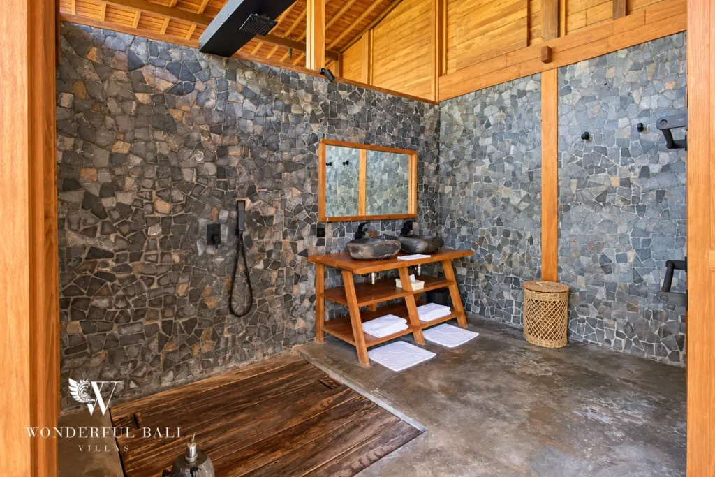 3BR villa Seseh, Canggu — stone bathroom with rain shower