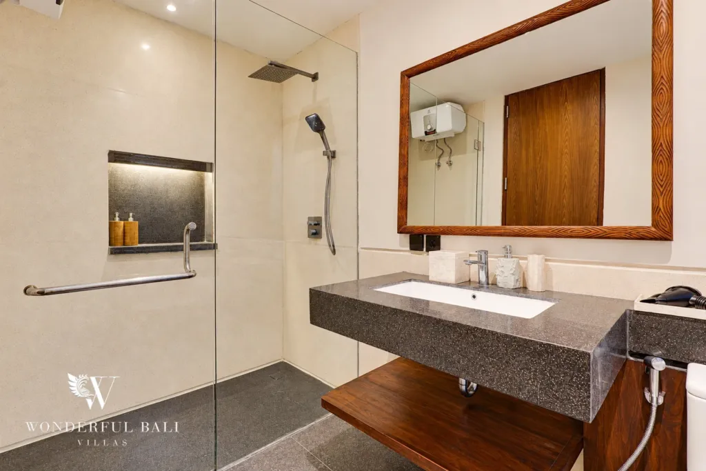 4BR villa for sale in Canggu — bathroom with stone vanity and rain shower