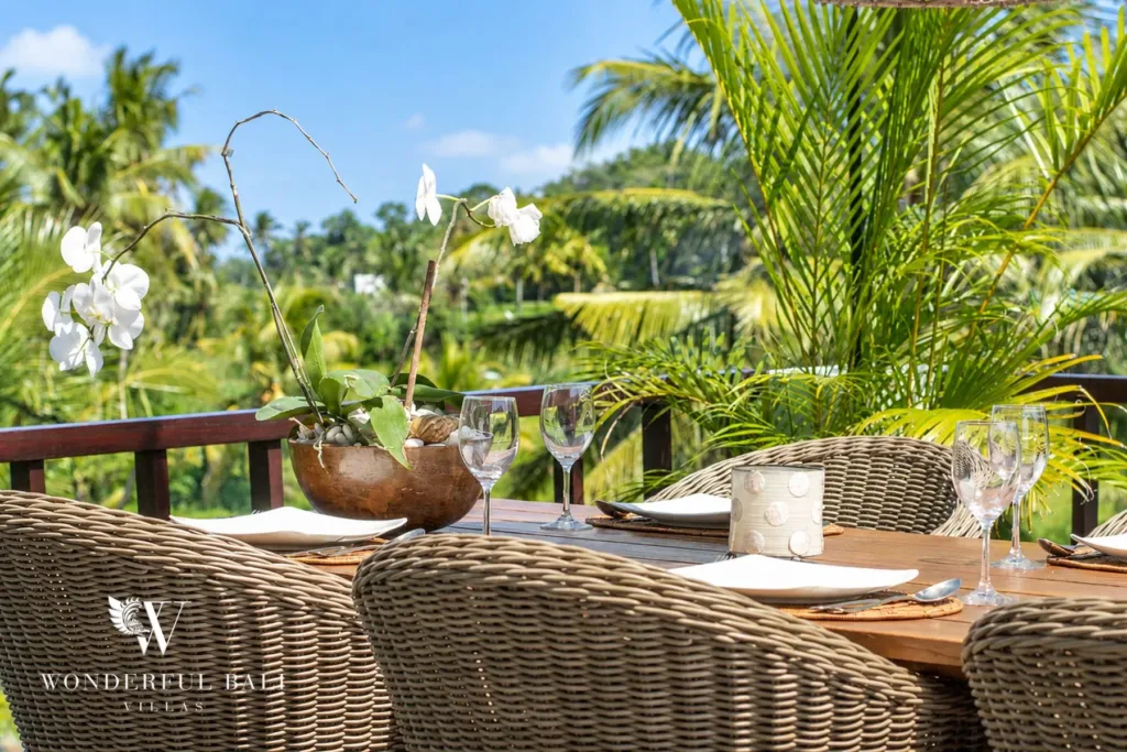 3BR villa for rent in Tabanan — table set for dinner with palm and rice field views