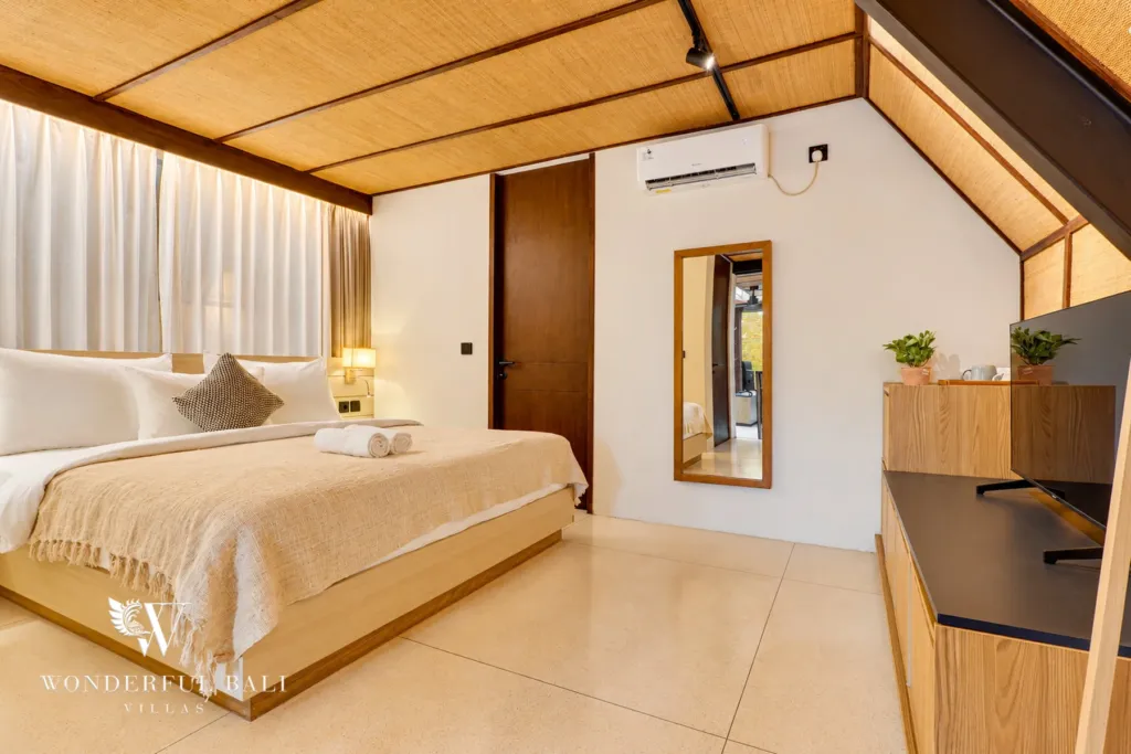 4BR villa for sale in Canggu — bedroom under a bamboo ceiling