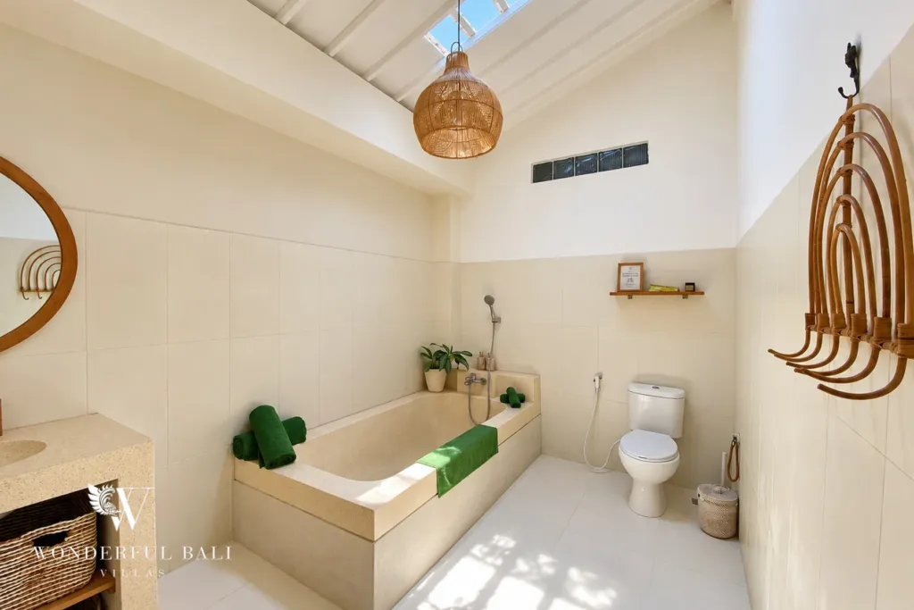 2BR villa Berawa, Canggu — bathroom with built-in bathtub