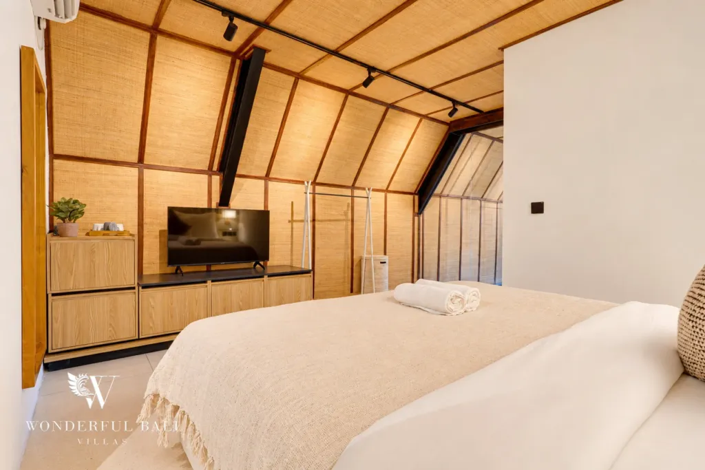4BR villa for sale in Canggu — bedroom with TV cabinet and garment rail