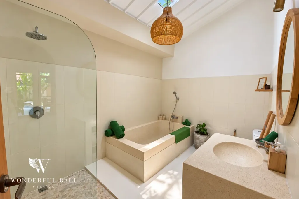 2BR villa Berawa, Canggu — bathroom with rain shower and bathtub