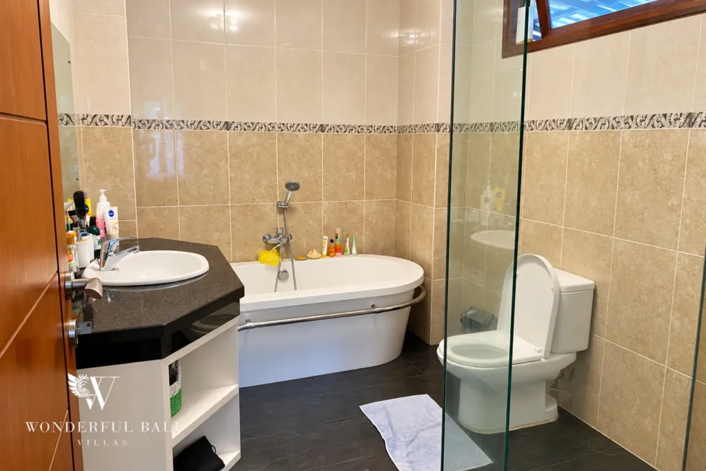 3BR villa for rent in Sanur — bathroom with freestanding bathtub and shower
