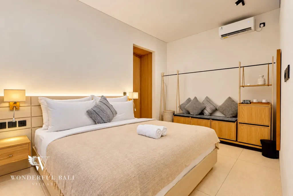 4BR villa for sale in Canggu — bedroom with double bed and storage bench