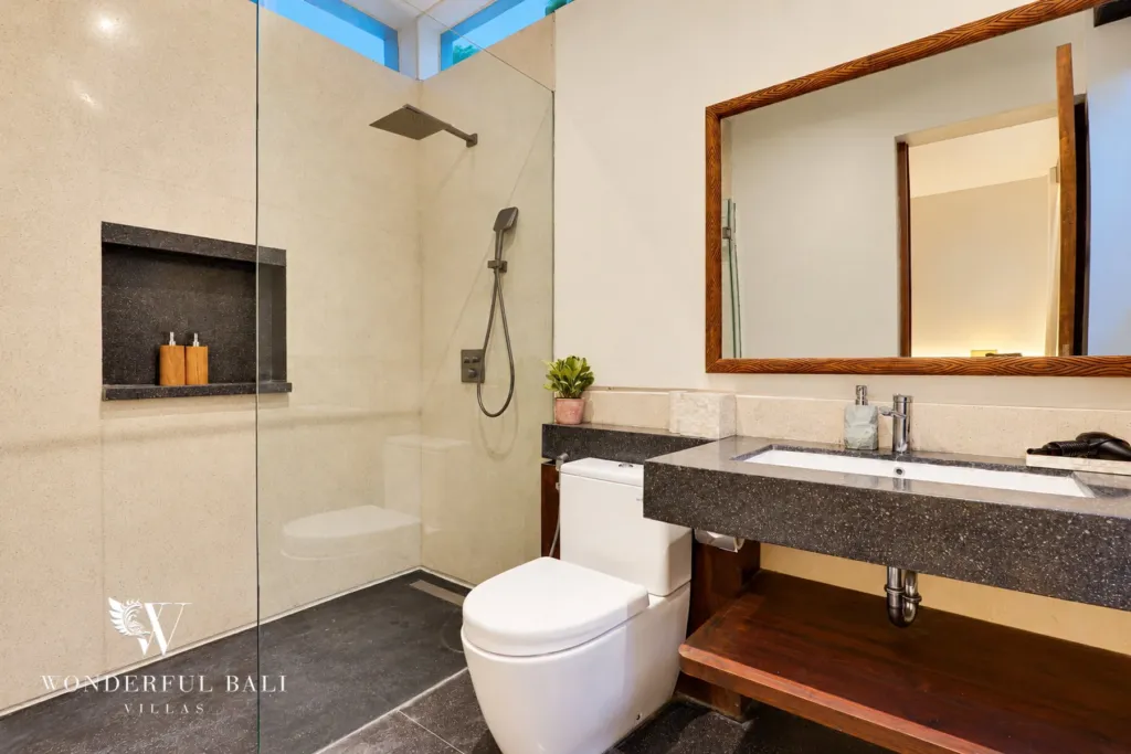4BR villa for sale in Canggu — bathroom with rain shower and stone vanity